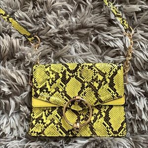 Yellow snake skin bag